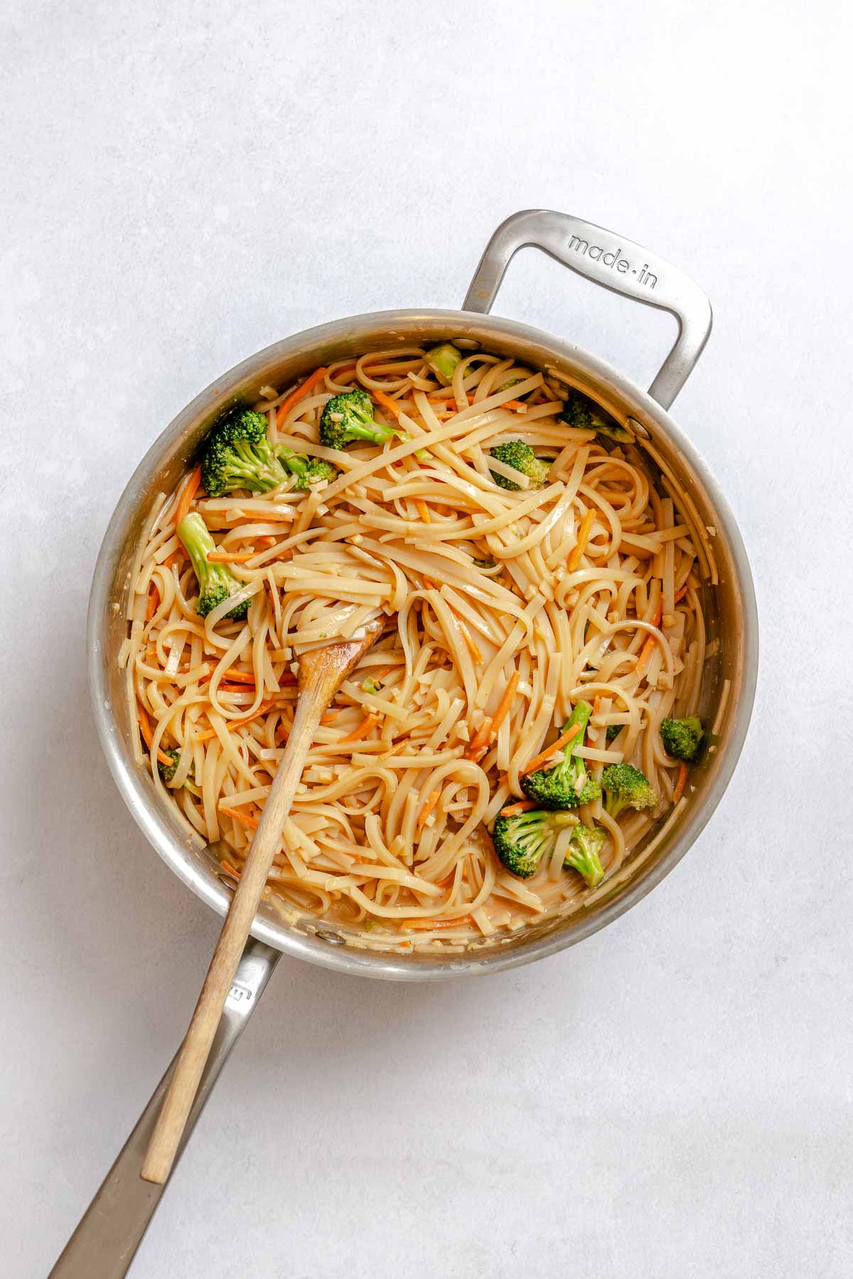 Cooked vegan pad Thai with broccoli and carrots, ready to serve.