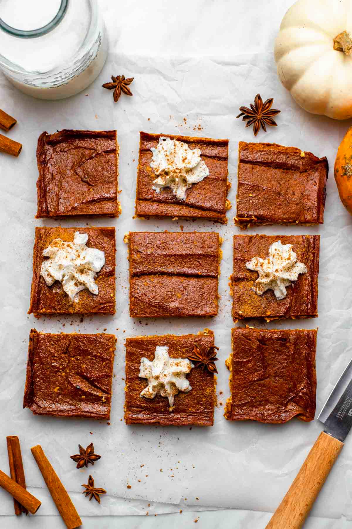 Vegan pumpkin pie bars, sliced into squares.