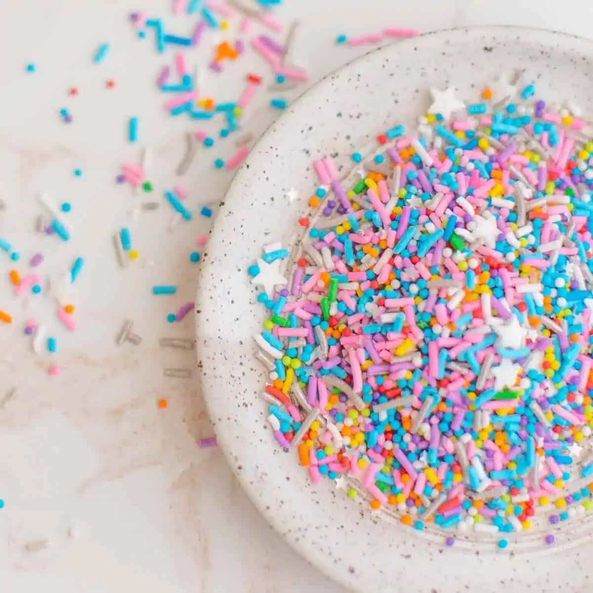 A plate of sprinkles free from animal-derived ingredients.