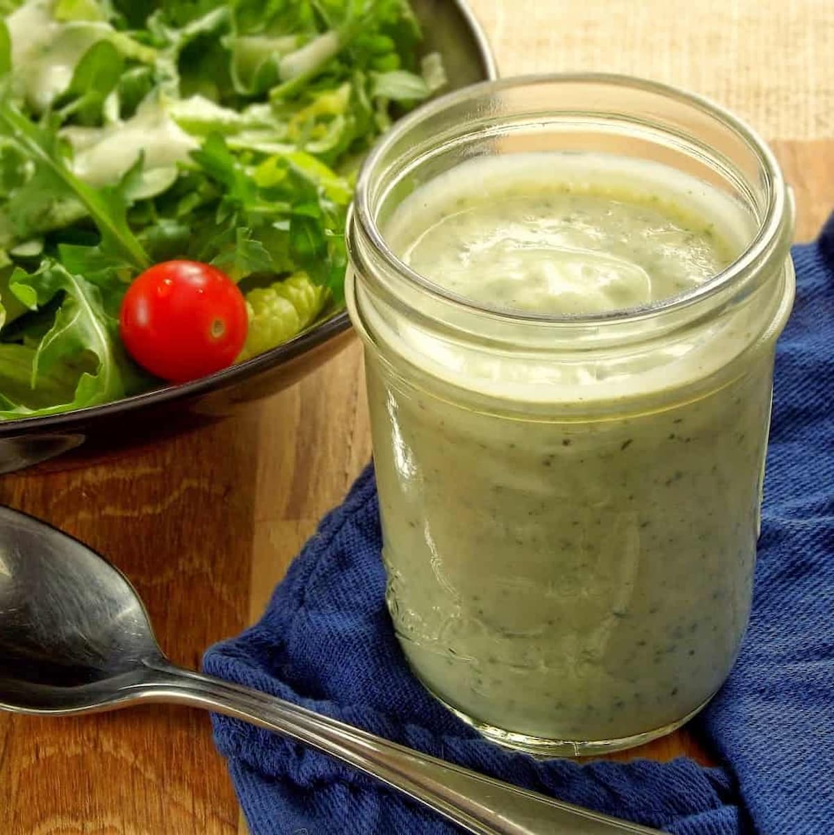 A jar of vegan ranch dressing made with silken tofu.