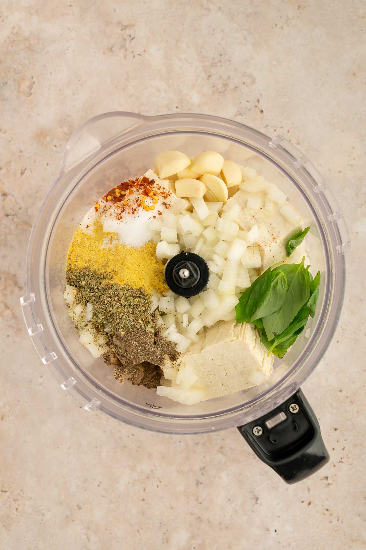 Ingredients for tofu ricotta in a food processor.