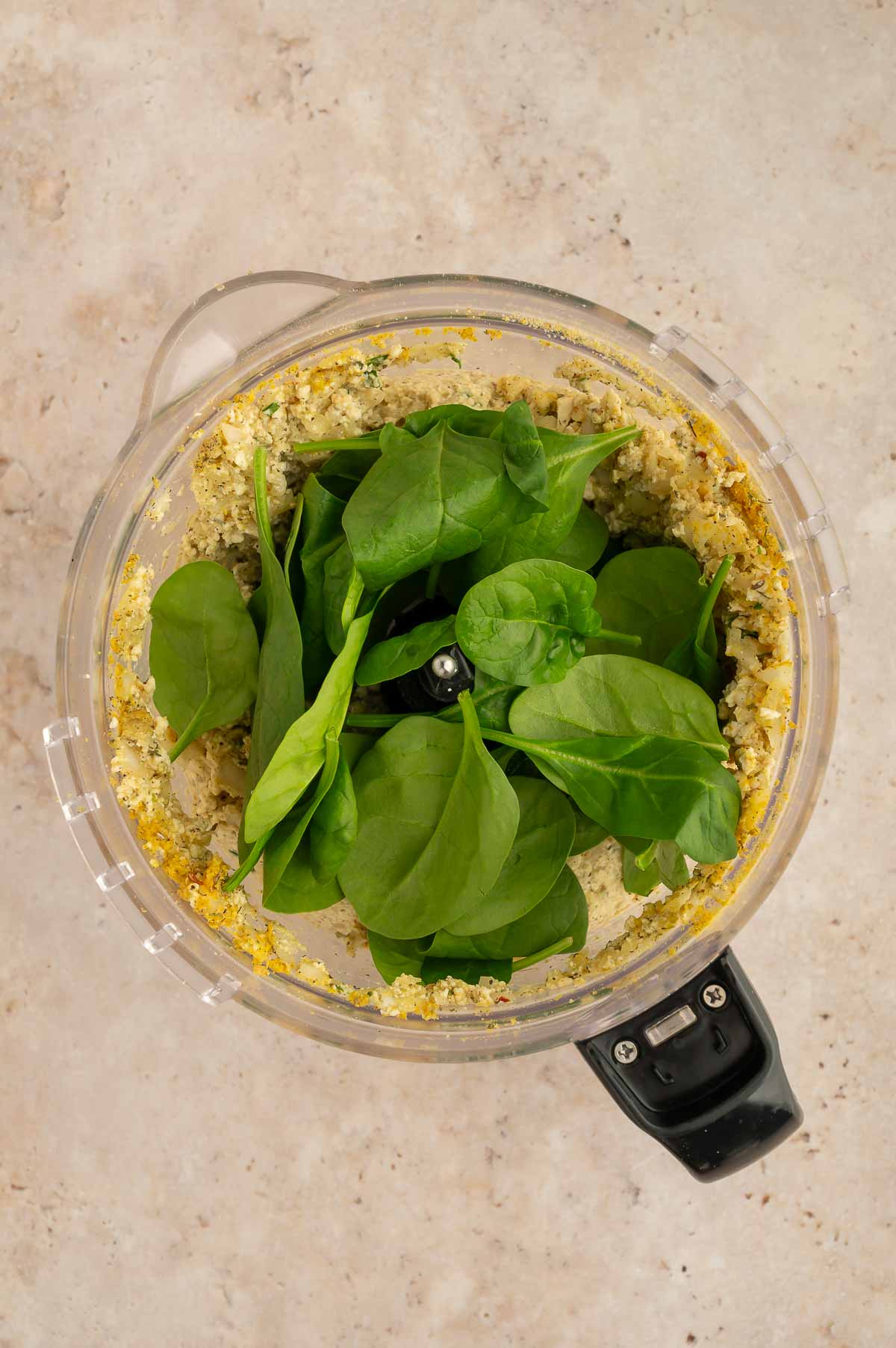 Spinach in a food processor.