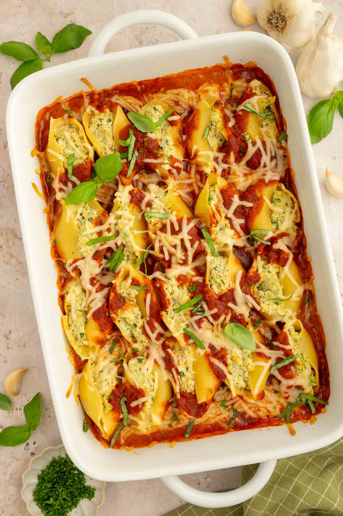 A casserole dish with vegan stuffed shells.