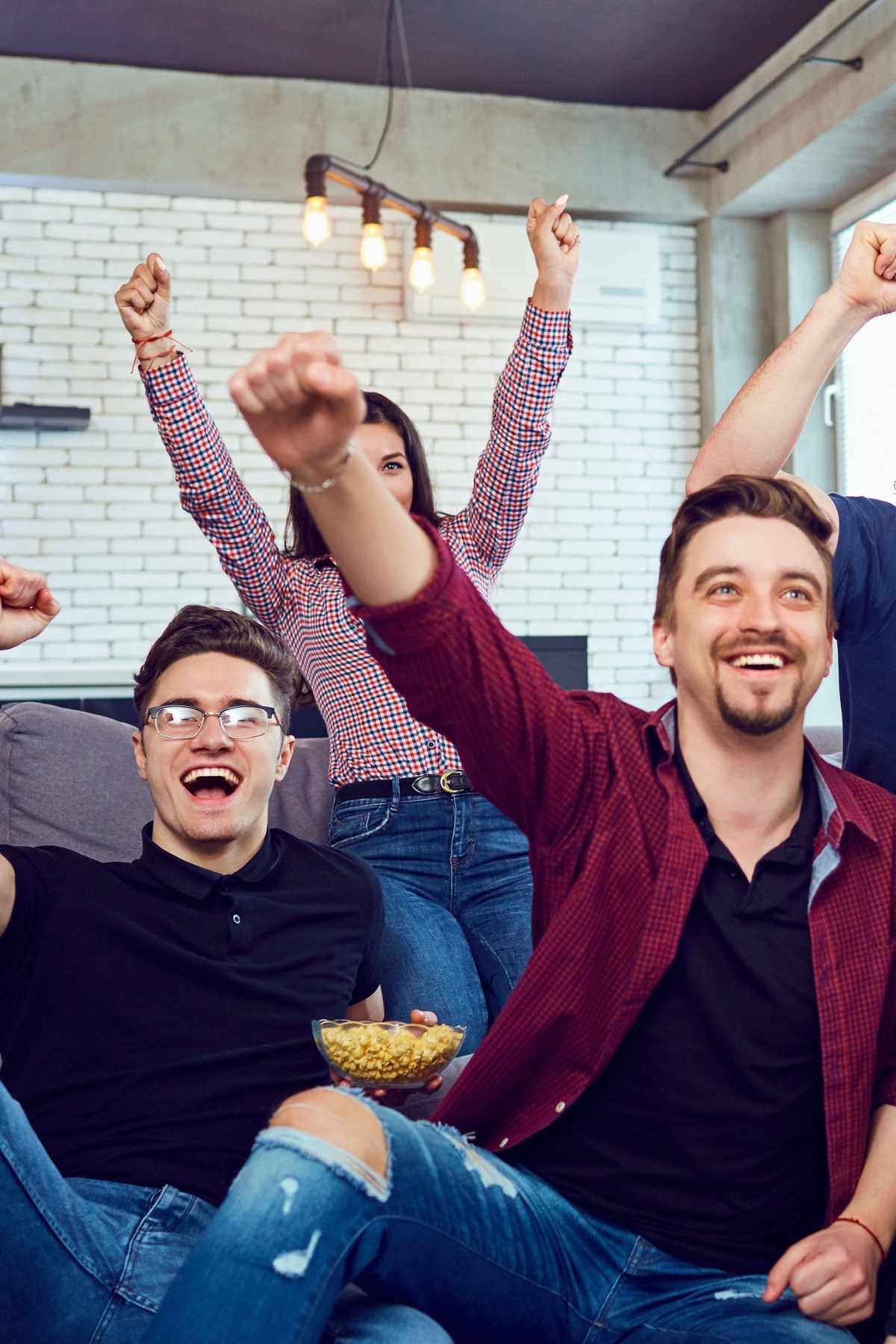 People watching television in a living room.